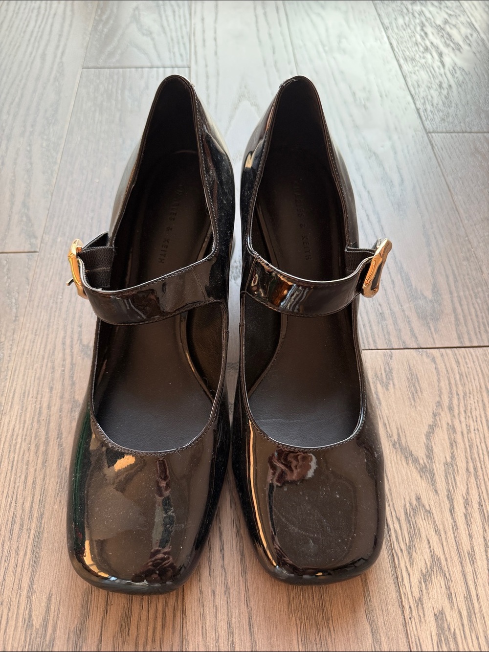 Charles & Keith Black Patent Mary Jane Heels with Gold Buckles
